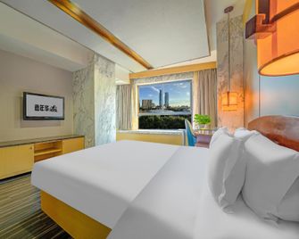 Huzhou Carnival Hotel - Huzhou - Habitación