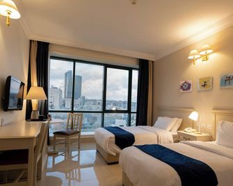 Amman West Luxury Hotel - עמאן - חדר שינה