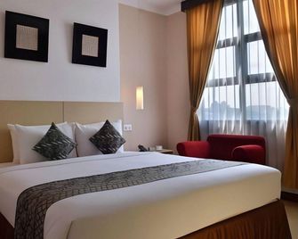Uny Hotel - Yogyakarta - Bedroom