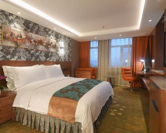 Spring Hotel - Dalian - Habitación