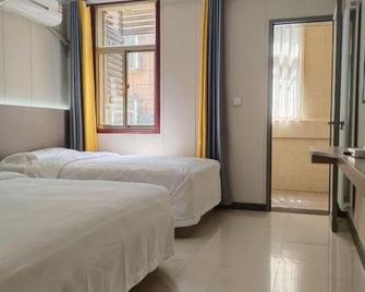 Weishuiyuan Hotel (Xianyang International Airport) - Xianyang - Slaapkamer