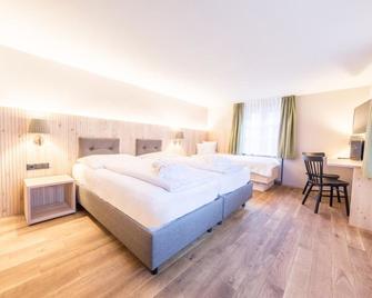 Hotel Sonne - Brand - Schlafzimmer