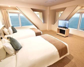 Odysis Suites Osaka Airport Hotel - Izumisano - Bedroom