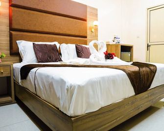 فندق كومفرت في مدينة دجيبوتي - مدينة جيبوتي - غرفة نوم