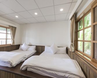 Guanwu Villa - Tai'an Township - Спальня