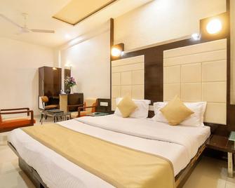 Hotel Satkar - Surat - Habitación