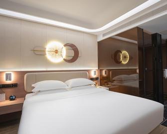 Qinhuangdao Xiadu Garden Hotel (People's Square) - Čchin-chuang-tao - Ložnice