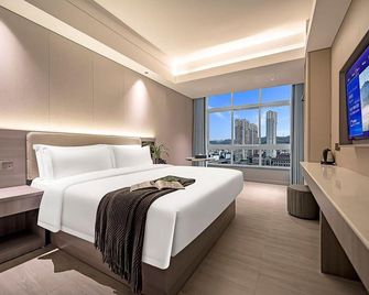 Meijin Hotel (Jishou Railway Station Branch) - Xiangxi - Habitación