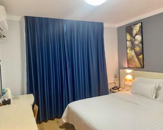 Xianchaoda Chain Hotel (Huludao Huaji Road) - Huludao - Habitación