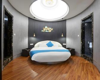 Houston International Hotel (Longyan Zhongshan Street Branch) - Longyan - Habitación