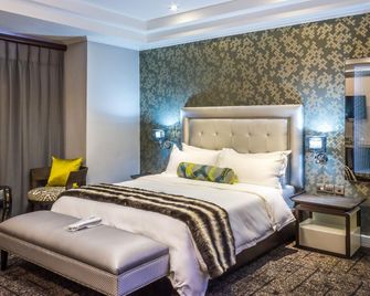 Staywell Hotels - Gaborone - Slaapkamer