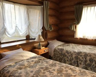 log Hotel kamloops - Shinano - Slaapkamer