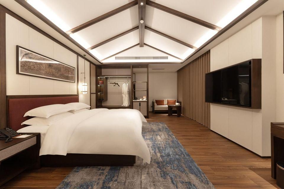 Guangyuan Jianmenguan Tianci Hot Spring Vacation Hotel - Guangyuan - Bedroom