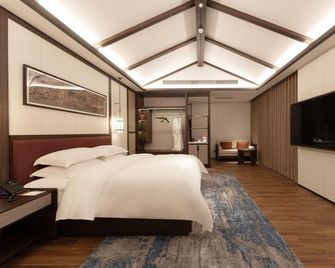 Guangyuan Jianmenguan Tianci Hot Spring Vacation Hotel - Guangyuan - Bedroom