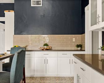 The whole group will be comfortable in this spacious and unique space. - Redlands - Kitchen