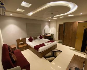 Hotel Manisha International - Gaia - Quarto
