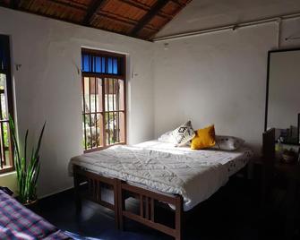 Ingedam- cosy double bedroom in Trivandrum city - ティルヴァナンタプラム - 寝室