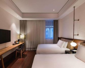 Starway Hotel Lanzhou New District Zhongchuan Airport - לנג'ואו - חדר שינה