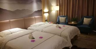 Loulan Hotel - Bayingolin - Bedroom