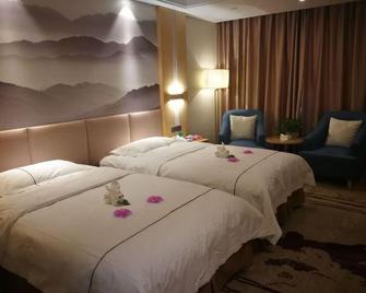 Loulan Hotel - Bayingolin - Bedroom