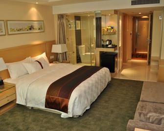 Ramada Plaza by Wyndham Shenyang City Center - Shenyang - Habitación
