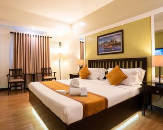 Prime City Resort Hotel - אנג'לס סיטי - חדר שינה