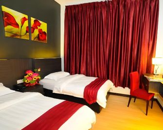 OYO 89908 Hotel Kensington - Sandakan - Ložnice