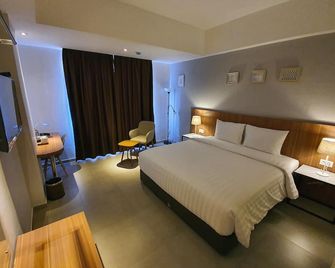 Hart Hotel Premium Rapatmaja - Mataram - Slaapkamer