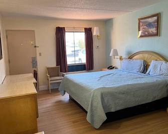 Quality Quarters Inn By OYO Richmond Ky I-75 - Richmond - Bedroom