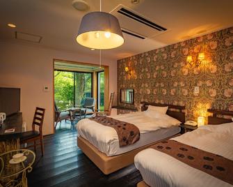 Soranoniwa Petit Hotel - Nihonmatsu - Camera da letto