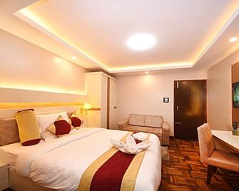Alpine Apartment and Homestay - Kathmandu - Bedroom