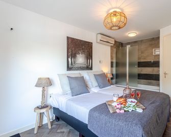Hajé Waterlodge en hotel ark de Aalscholver - Лелістад - Спальня