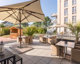 Park Inn by Radisson Göttingen - Göttingen - Patio