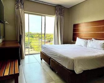 Woodlane Hotel - Gaborone - Schlafzimmer