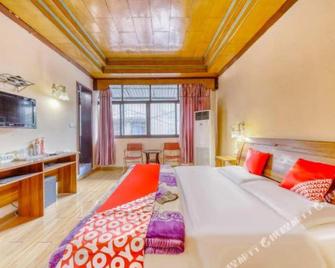 Mianyang Longfeng Guest House - Mianyang - Habitación