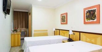 Hotel Domani - Guarulhos - Schlafzimmer