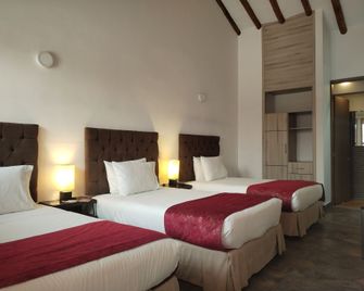 Hotel Capitan Ricaurte - Villa de Leyva - Makuuhuone