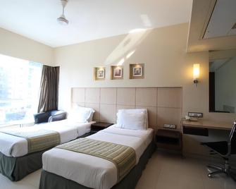 Hotel Varishtta Executive Inn - נבי מומבאי - חדר שינה