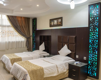 Al Sultan Inn Hotel - Jazan - Schlafzimmer