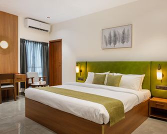 Hotel Karthiyayini - Cherthala - Slaapkamer