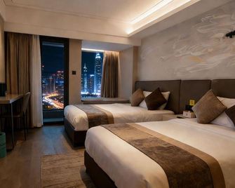 Yujuexecutive Apartments - Shenzhen - Schlafzimmer