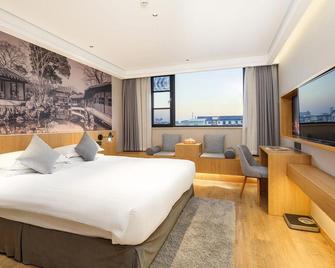 Suzhou Overseas Chinese Hotel - Suzhou - Bedroom