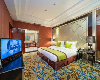 Xiyuan Jinrun Hotel (Guiyang Huaxi Xiaohe Branch) - Guiyang - Bedroom