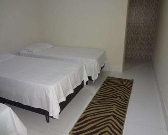 Pousada PG One - Praia Grande - Quarto