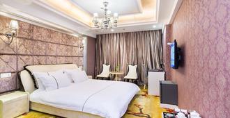 Yiwu Lvgu Hotel - Jinhua - Κρεβατοκάμαρα