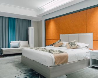 Wuyue International Hotel - Jiujiang - Bedroom