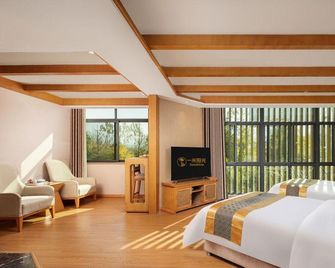 Yimi Sunshine Boutique Hotel (Xichang Qionghai Wetland Park) - Liangshan - Bedroom