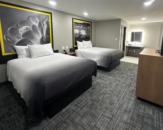 Super 8 By Wyndham Lubbock Airport - Lubbock - Habitación
