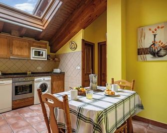 Apartamentos Rurales La Vina - Onís - Eetruimte