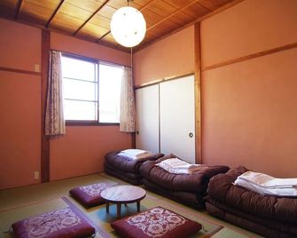 Hida Takayama Guest House tau - Hostel - טקאיאמה - חדר שינה